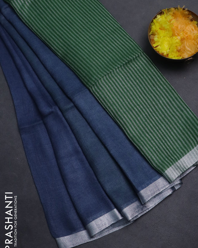 Pure linen saree peacock blue and green with plain body and silver zari woven border