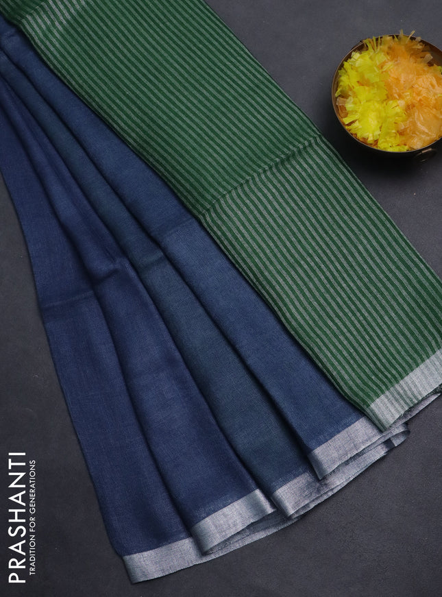Pure linen saree peacock blue and green with plain body and silver zari woven border
