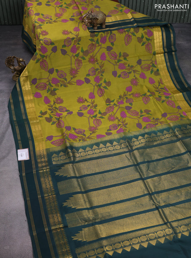 Silk cotton saree lime green and bottle green with allover kalamkari prints and temple design zari woven border