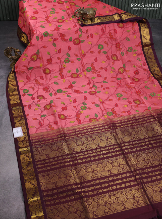 Silk cotton saree peach pink and deep maroon with allover kalamkari prints and zari woven korvai border