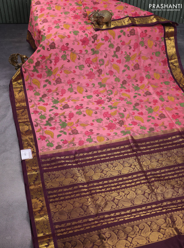 Silk cotton saree peach pink and wine shade with allover kalamkari prints and zari woven korvai border