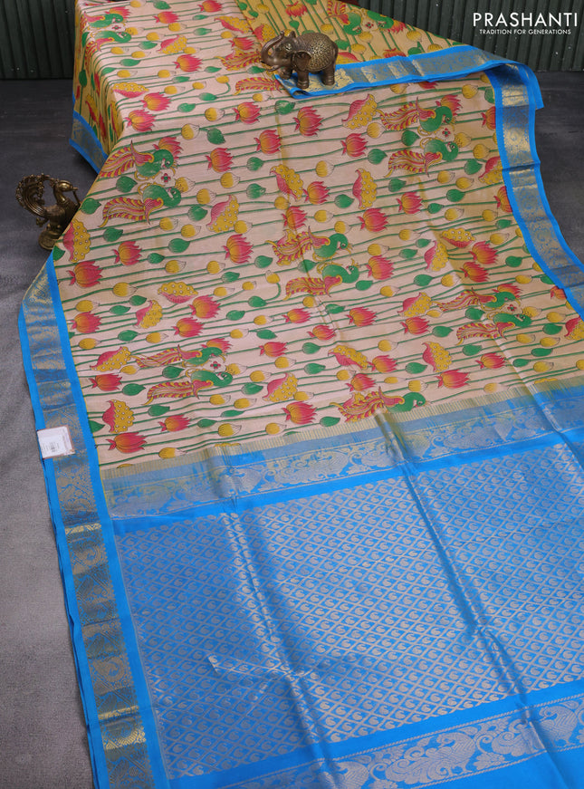 Silk cotton saree sandal and cs blue with allover kalamkari prints and zari woven korvai border