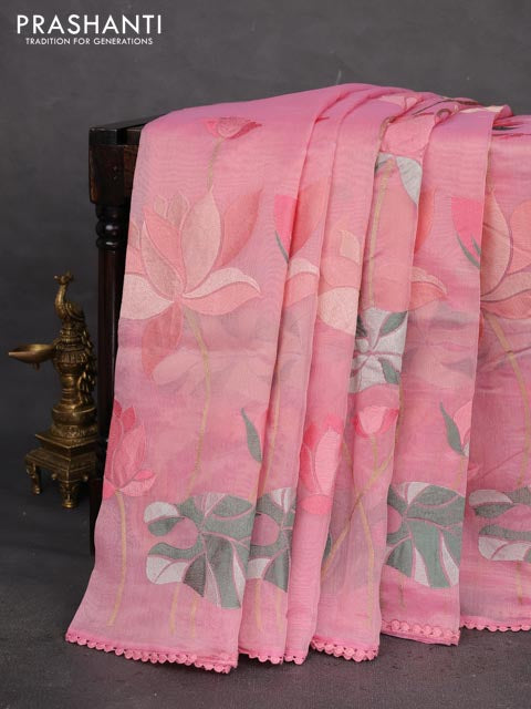 Chanderi tissue saree peach pink with allover floral embroidery and lace work border