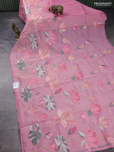 Chanderi tissue saree peach pink with allover floral embroidery and lace work border