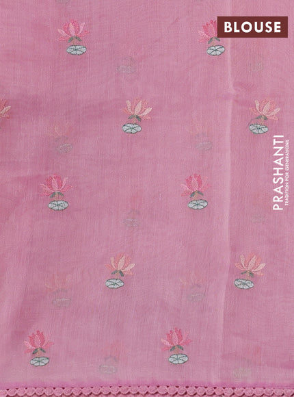 Chanderi tissue saree peach pink with allover floral embroidery and lace work border