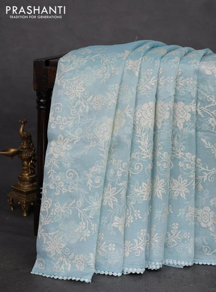 Chanderi tissue saree teal blue with allover embroidery and lace work border