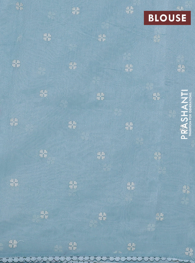 Chanderi tissue saree teal blue with allover embroidery and lace work border