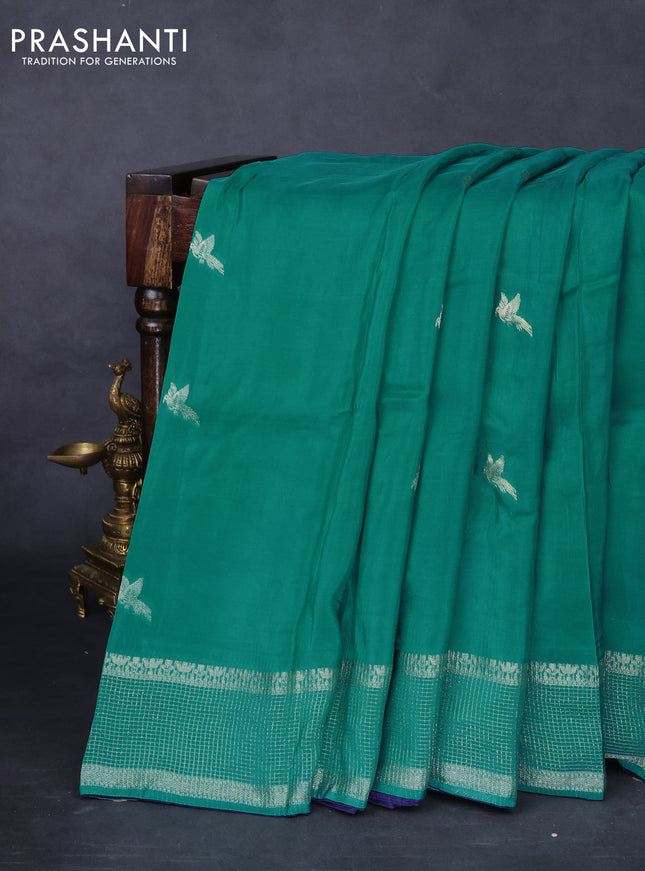 Banarasi silk saree teal blue and navy blue with zari woven brids buttas and zari woven border