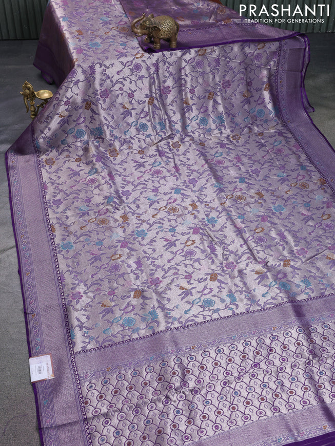 Banarasi tissue silk saree violet with allover thread woven floral weaves and silver zari woven border