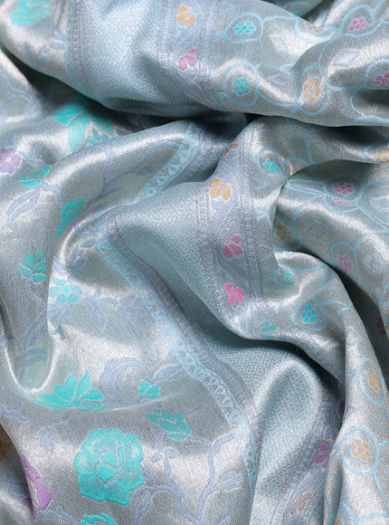 Banarasi tissue silk saree pastel blue with allover thread woven floral weaves and silver zari woven border