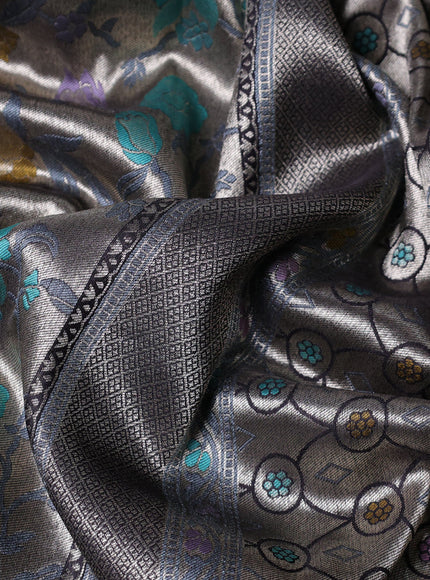 Banarasi tissue silk saree black with allover thread woven floral weaves and silver zari woven border