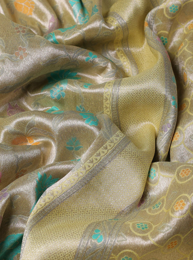 Banarasi tissue silk saree pale yellow with allover thread woven floral weaves and silver zari woven border