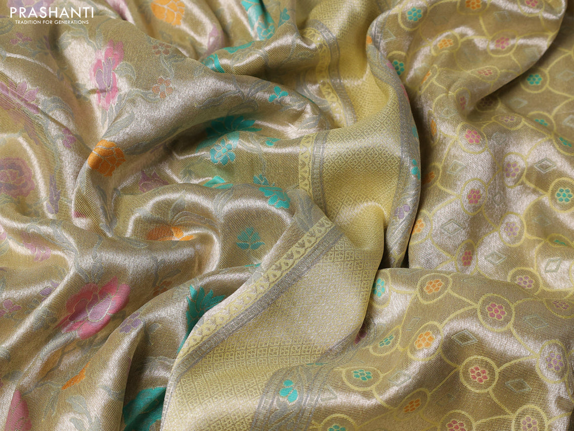 Banarasi tissue silk saree pale yellow with allover thread woven floral weaves and silver zari woven border