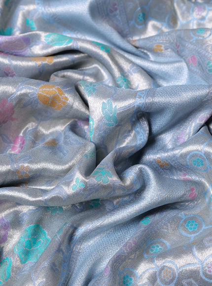 Banarasi tissue silk saree light blue with allover thread woven floral weaves and silver zari woven border