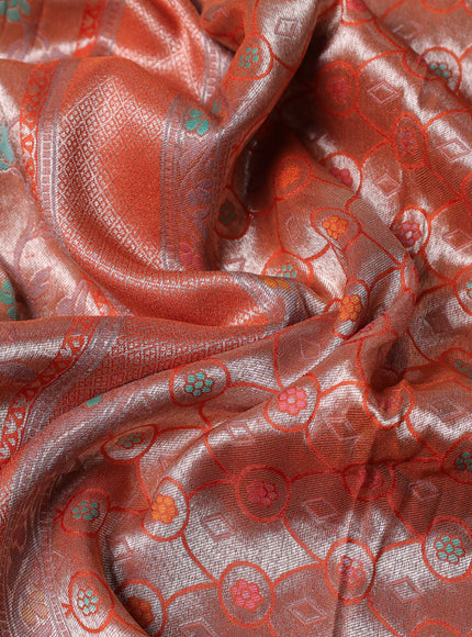 Banarasi tissue silk saree rustic orange with allover thread woven floral weaves and silver zari woven border