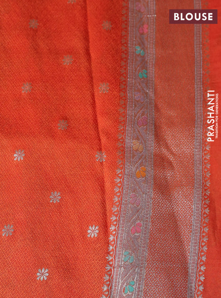 Banarasi tissue silk saree rustic orange with allover thread woven floral weaves and silver zari woven border