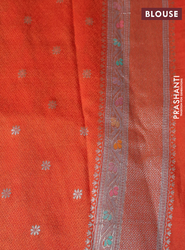Banarasi tissue silk saree rustic orange with allover thread woven floral weaves and silver zari woven border