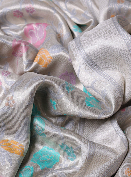 Banarasi tissue silk saree off white with allover thread woven floral weaves and silver zari woven border