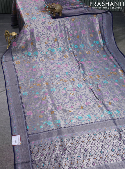 Banarasi tissue silk saree navy blue with allover thread woven floral weaves and silver zari woven border