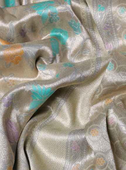 Banarasi tissue silk saree mild pista green with allover thread woven floral weaves and silver zari woven border