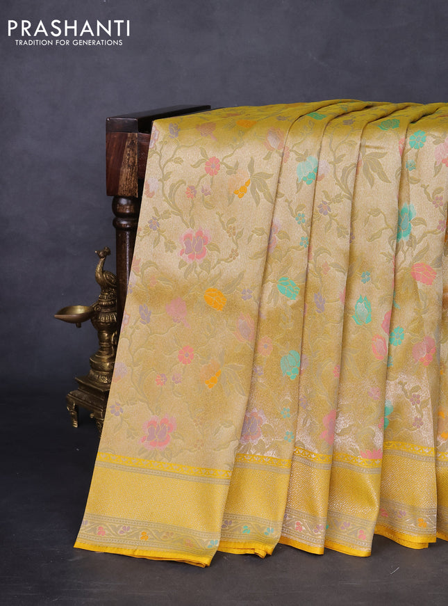 Banarasi tissue silk saree yellow with allover thread woven floral weaves and silver zari woven border