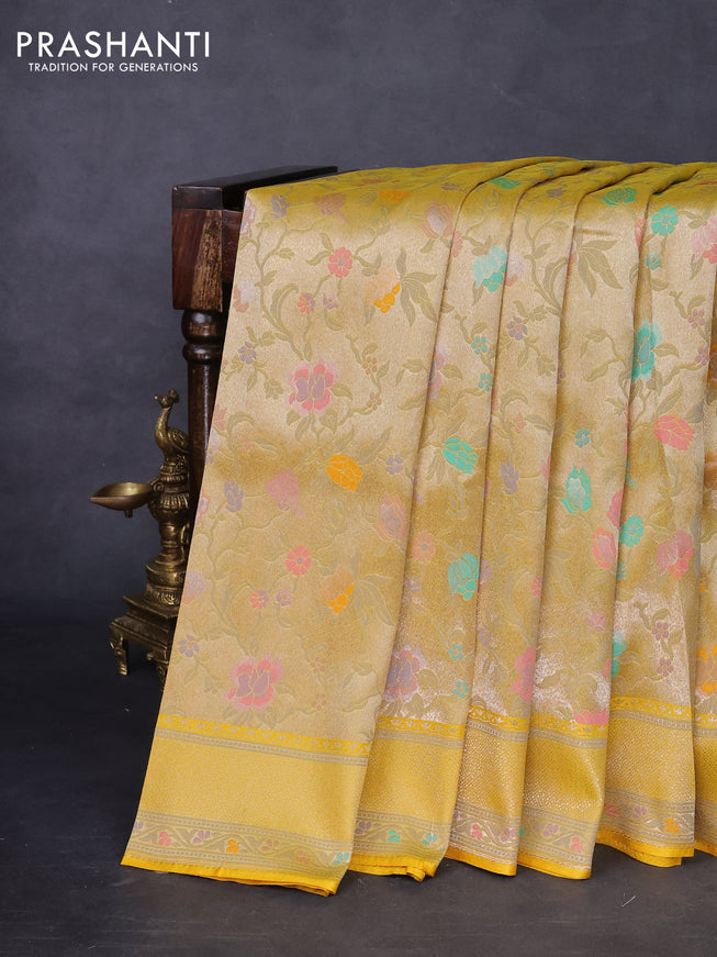 Banarasi tissue silk saree yellow with allover thread woven floral weaves and silver zari woven border