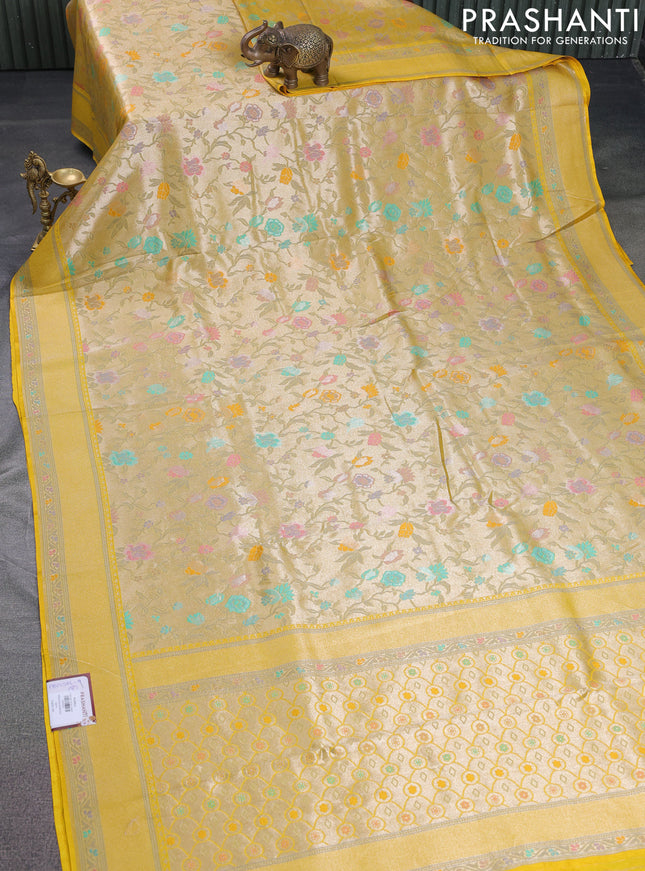 Banarasi tissue silk saree yellow with allover thread woven floral weaves and silver zari woven border