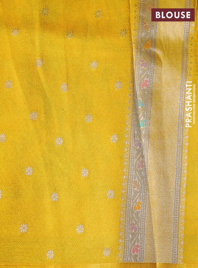 Banarasi tissue silk saree yellow with allover thread woven floral weaves and silver zari woven border