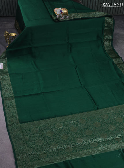Chiniya silk saree dark green with plain body and woven border