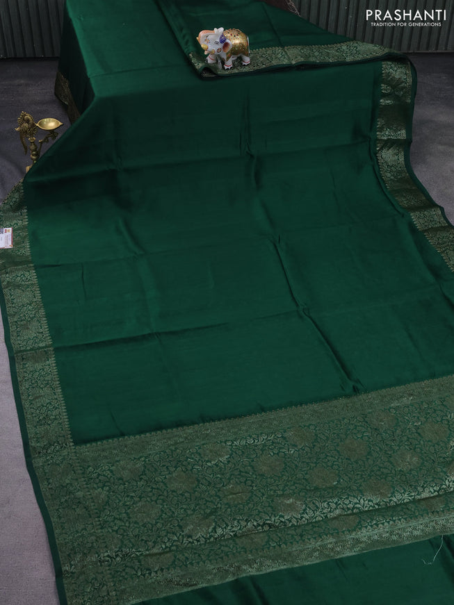 Chiniya silk saree dark green with plain body and woven border