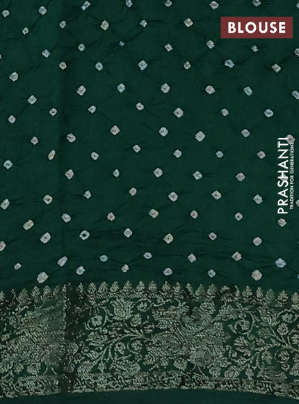 Chiniya silk saree dark green with plain body and woven border