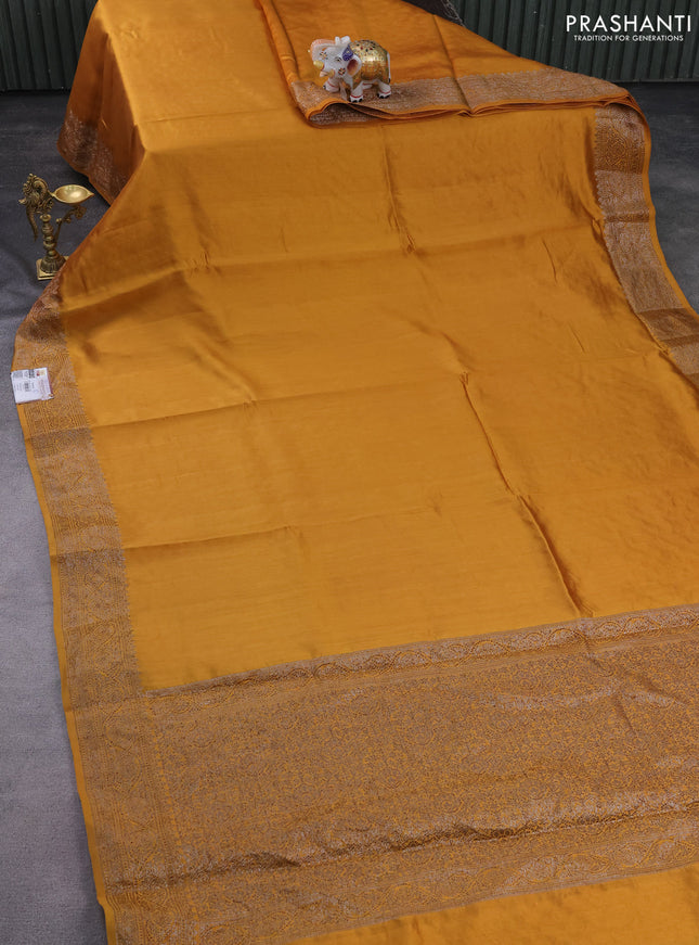 Chiniya silk saree dark mustard with plain body and woven border