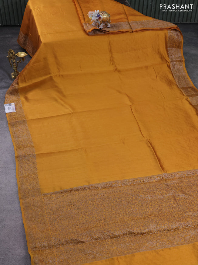 Chiniya silk saree dark mustard with plain body and woven border