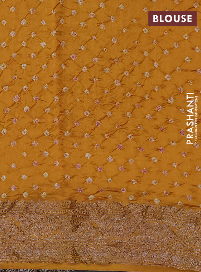 Chiniya silk saree dark mustard with plain body and woven border