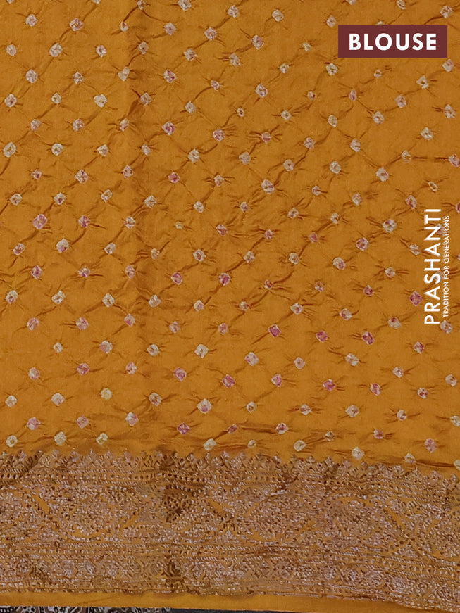 Chiniya silk saree dark mustard with plain body and woven border