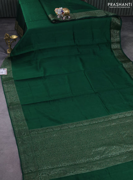 Chiniya silk saree green with plain body and woven border