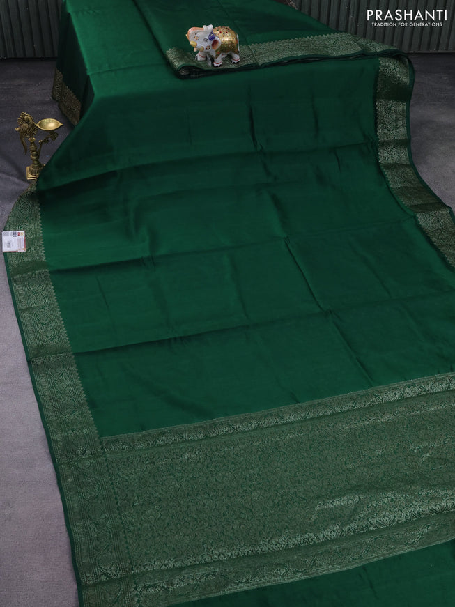 Chiniya silk saree green with plain body and woven border