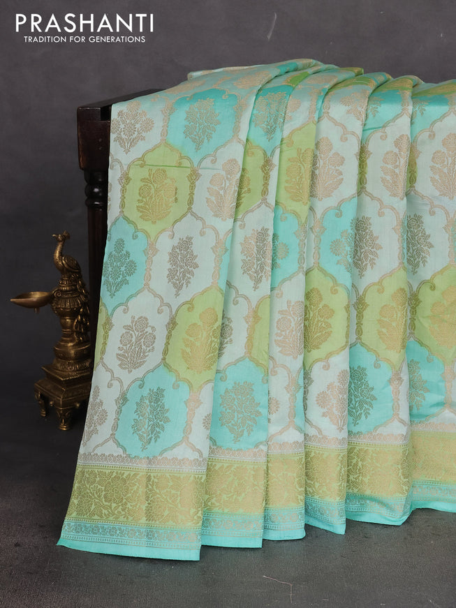 Chiniya silk saree teal blue shade and light green with allover zari weaves and zari woven border