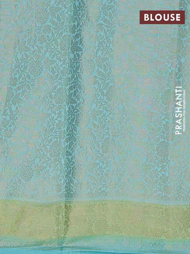 Chiniya silk saree teal blue shade and light green with allover zari weaves and zari woven border