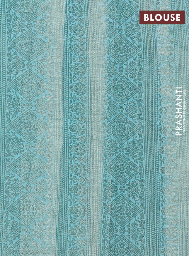 Chiniya silk saree teal blue with allover geometric zari weaves and small zari woven border