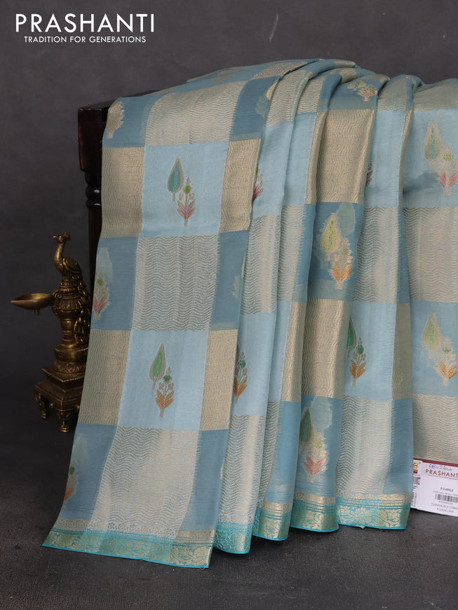 Chiniya silk saree greyish blue and teal blue with allover zari weaves and small zari woven border