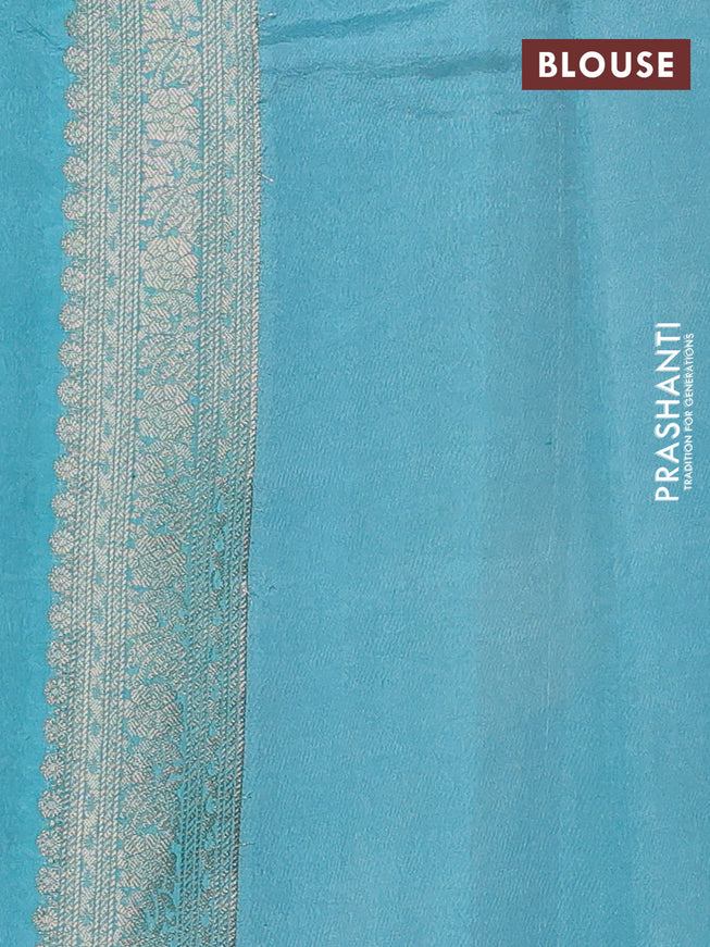 Chiniya silk saree greyish blue and teal blue with allover zari weaves and small zari woven border