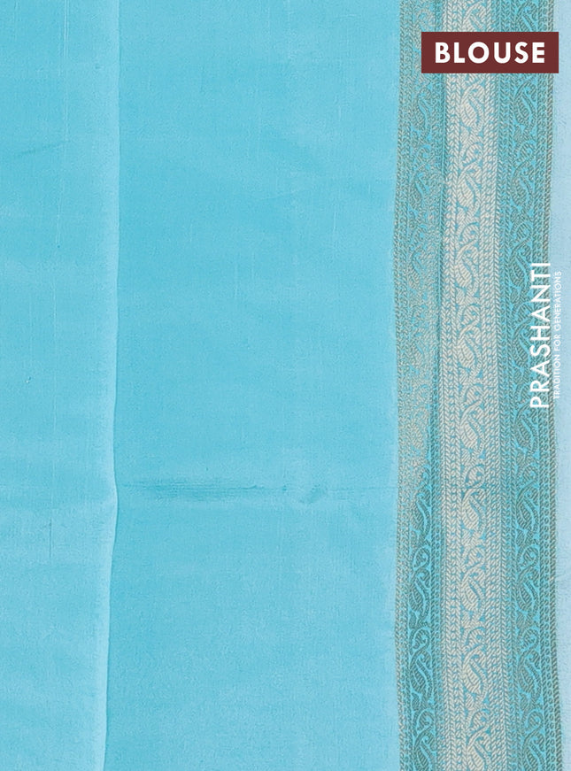 Chiniya silk saree teal blue with allover zari woven buttas and zari woven border