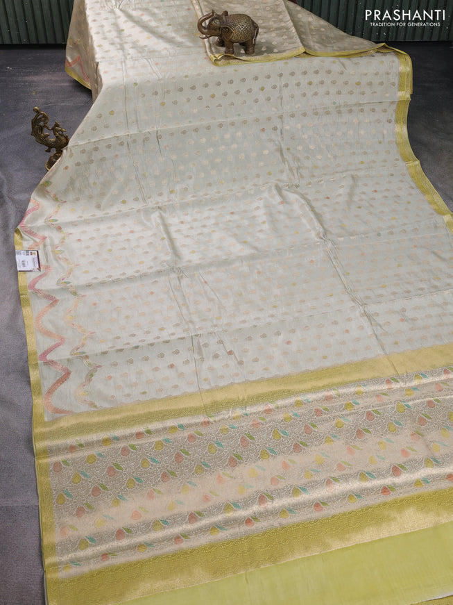 Chiniya silk saree cream and lime green with allover zari woven buttas and zari woven border