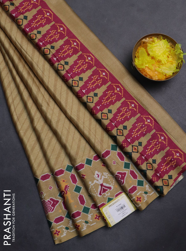 Semi tussar saree mustard yellow with leheriya prints and patola printed border