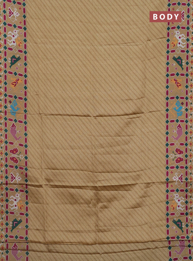 Semi tussar saree mustard yellow with leheriya prints and patola printed border