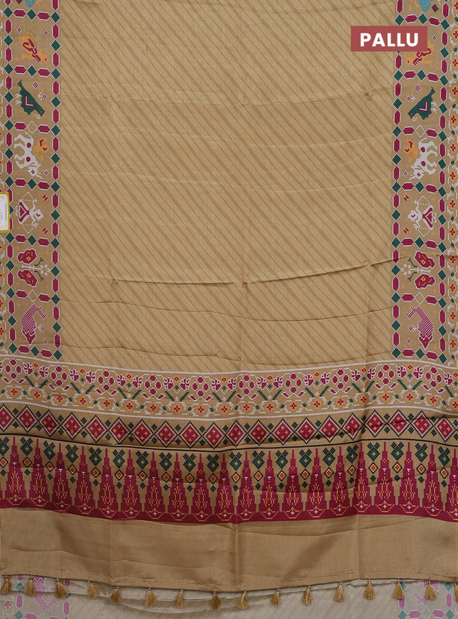 Semi tussar saree mustard yellow with leheriya prints and patola printed border