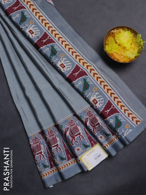 Semi tussar saree grey with plain body and patola printed border