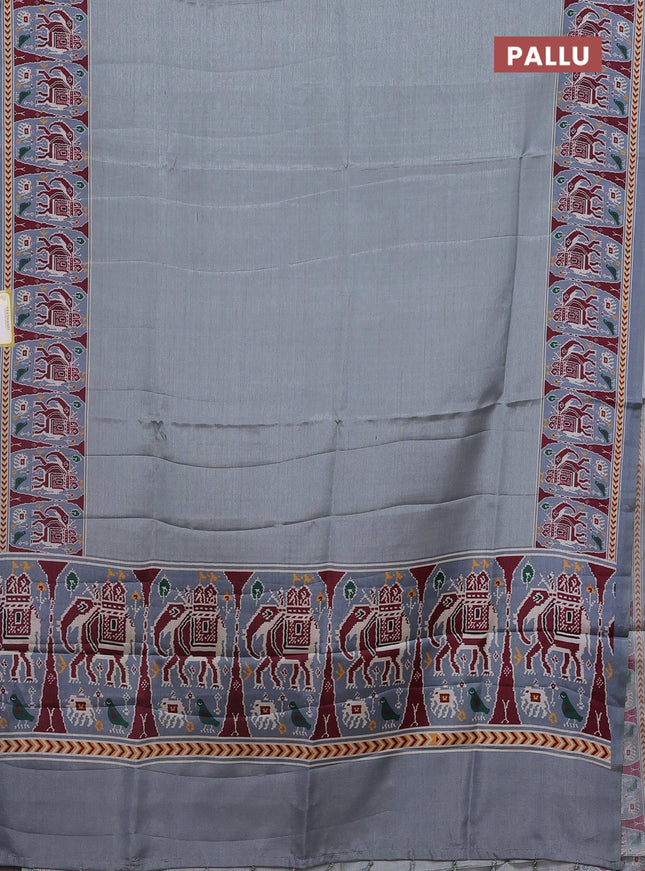 Semi tussar saree grey with plain body and patola printed border