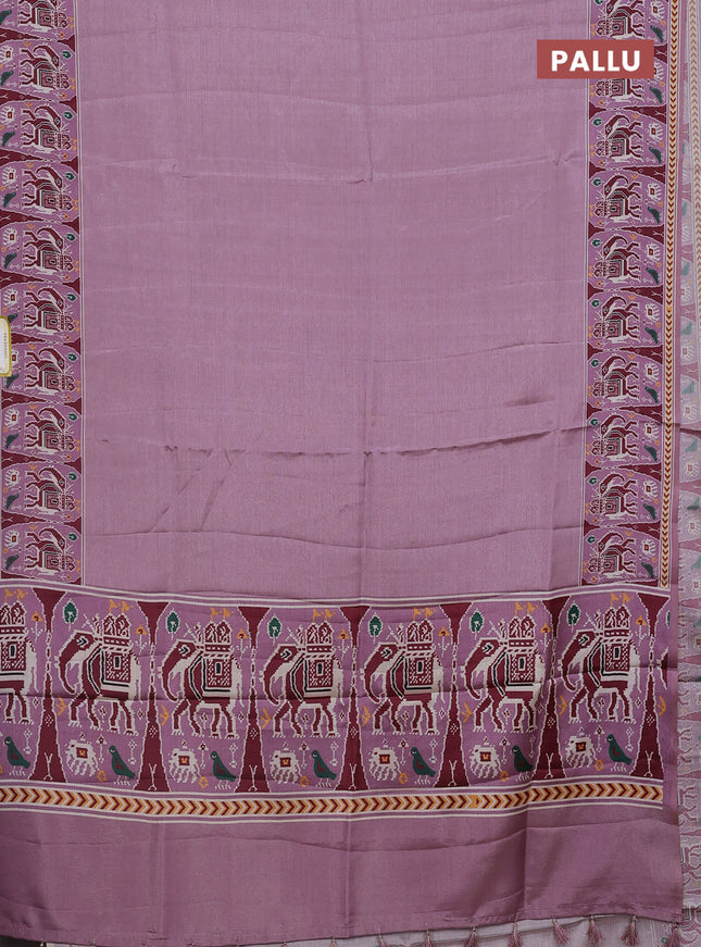 Semi tussar saree mild purple with plain body and patola printed border